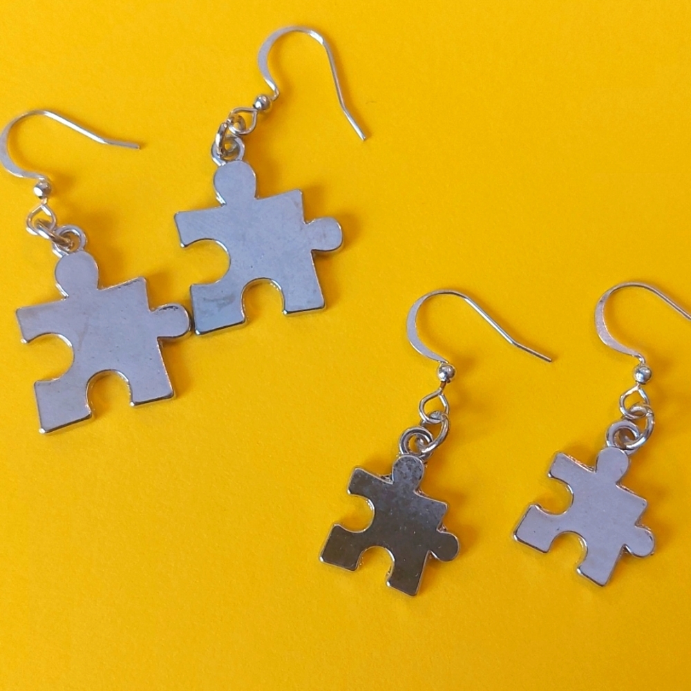 NWOT Metal Puzzle Piece Earrings